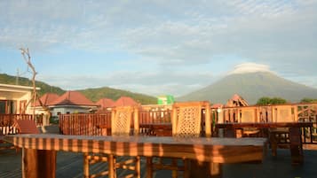 Breakfast, lunch served; local and international cuisine, pool views