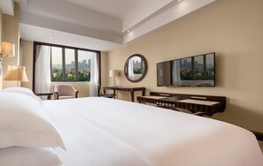 Habitación Premium, 1 cama King size, vista a la colina | Ropa de cama de alta calidad, edredón, camas con pillow-top y minibar