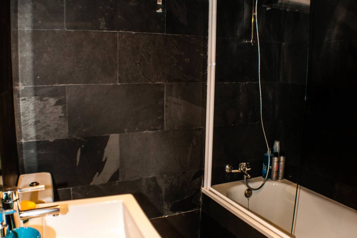 deluxe duplex, 1 bedroom, terrace | bathroom | combined shower/bathtub, deep-soaking bathtub, designer toiletries