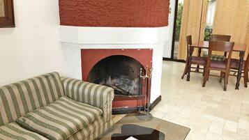 Townhome | Living area | 32-inch flat-screen TV with cable channels, TV