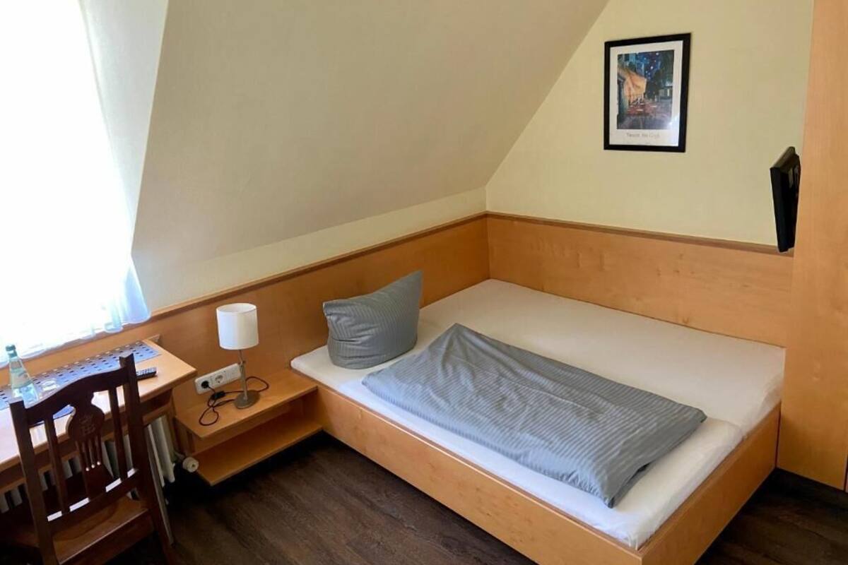 desk, blackout curtains, free wifi, bed sheets
