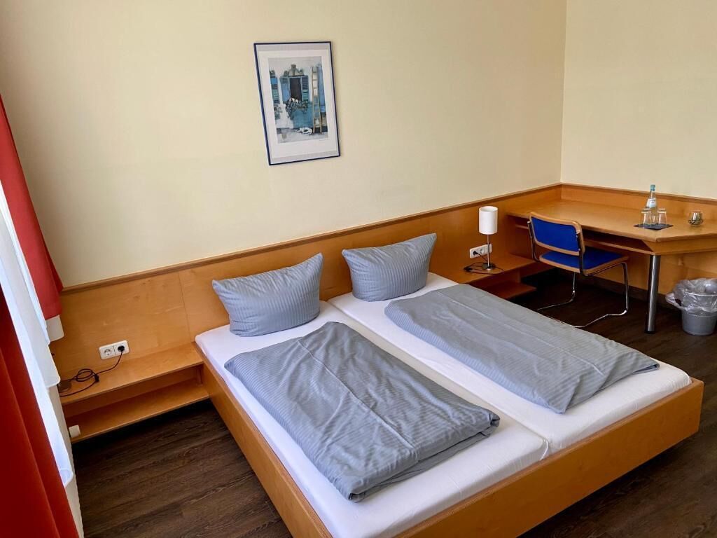 desk, blackout curtains, free wifi, bed sheets