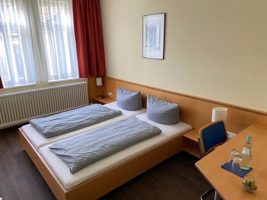 desk, blackout curtains, free wifi, bed sheets