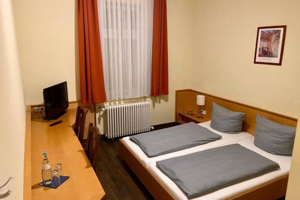 desk, blackout curtains, free wifi, bed sheets