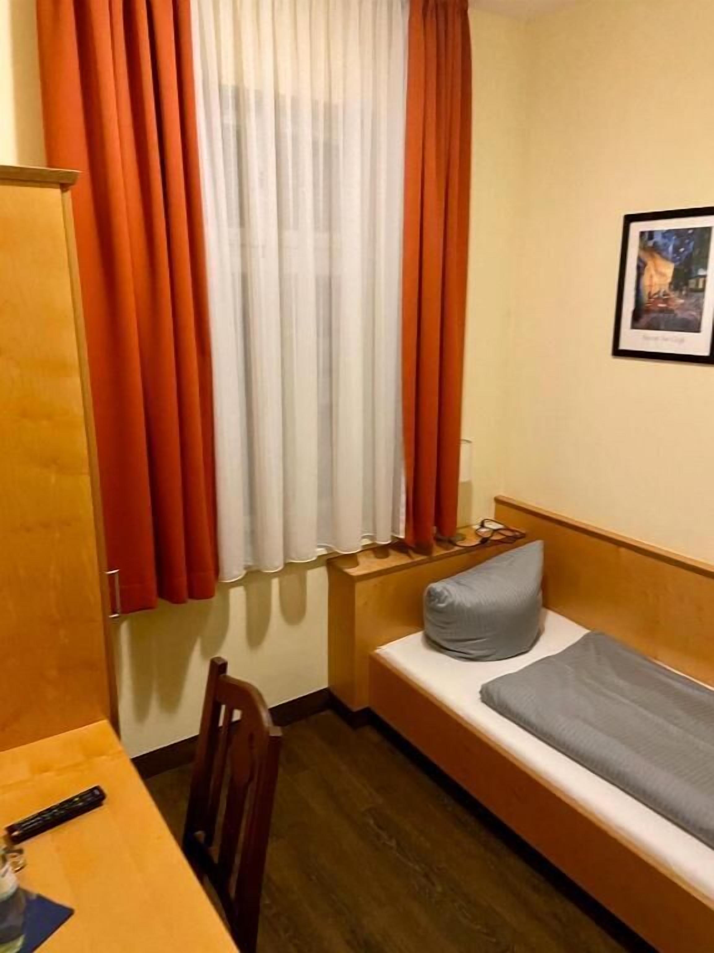 desk, blackout curtains, free wifi, bed sheets