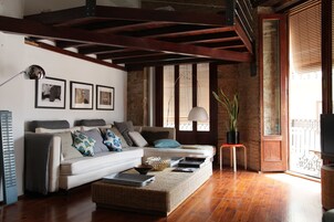 Loft, Balcony | Living area | Flat-screen TV, DVD player