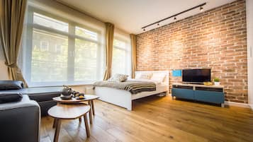 Deluxe Studio Suite, 1 Queen Bed with Sofa bed, Kitchen, City View | Premium bedding, individually decorated, individually furnished, desk