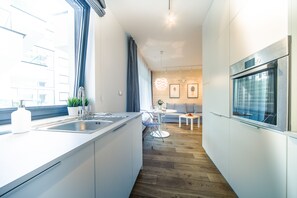 Superior Studio Suite, Balcony, City View | Private kitchenette