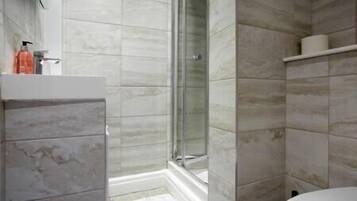 Shower, free toiletries, hair dryer, towels