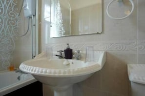 Shower, free toiletries, hair dryer, towels