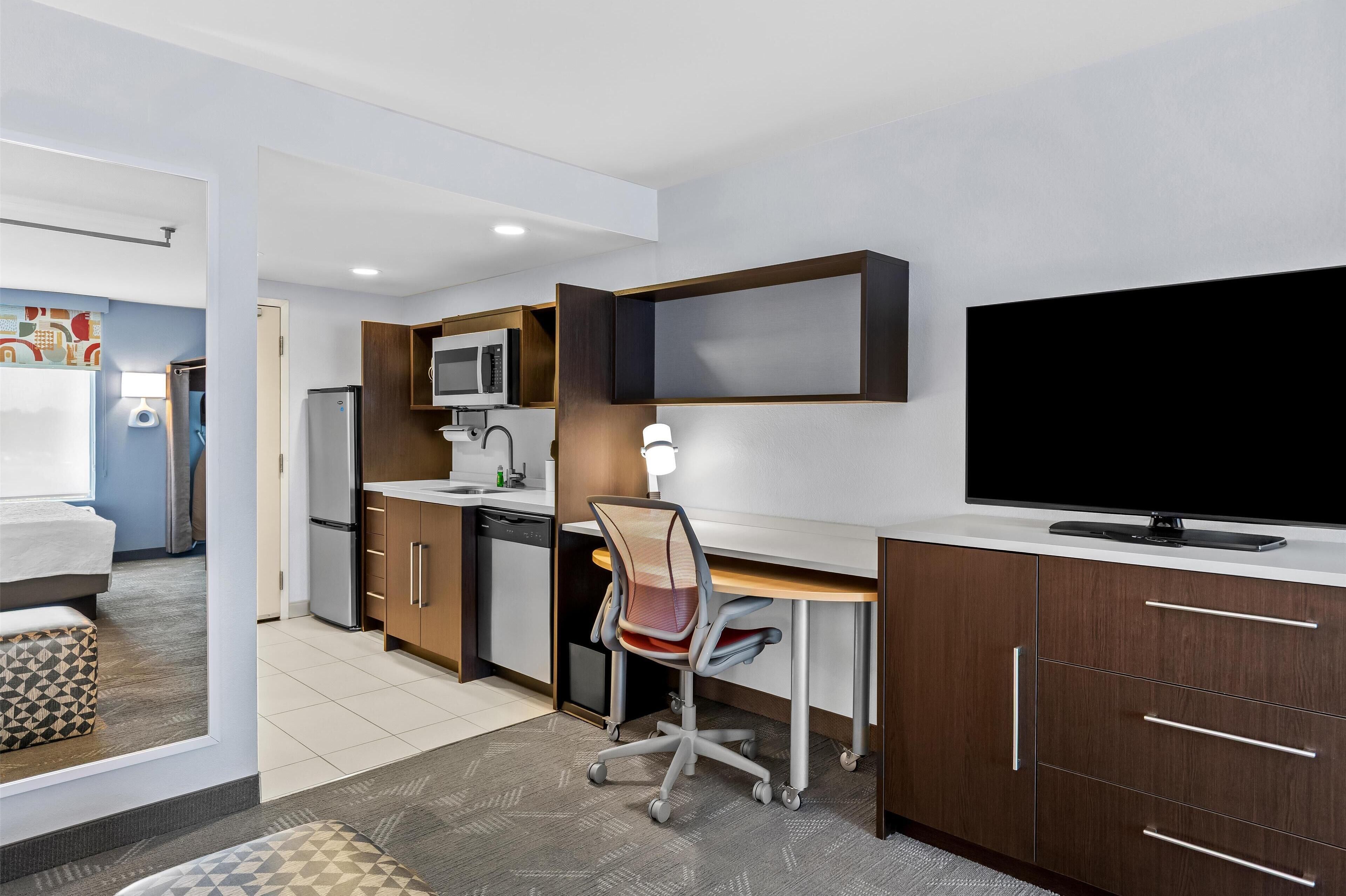 full-sized fridge, microwave, dishwasher, coffee/tea maker