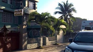 Guests of Label Maison can stroll along the cobblestone street lined with palm trees.