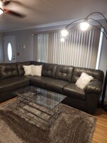 Suite | Living room | 40-inch flat-screen TV with cable channels, TV