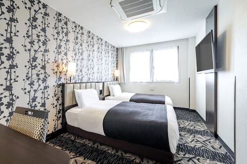 Down comforters, desk, free WiFi, bed sheets
