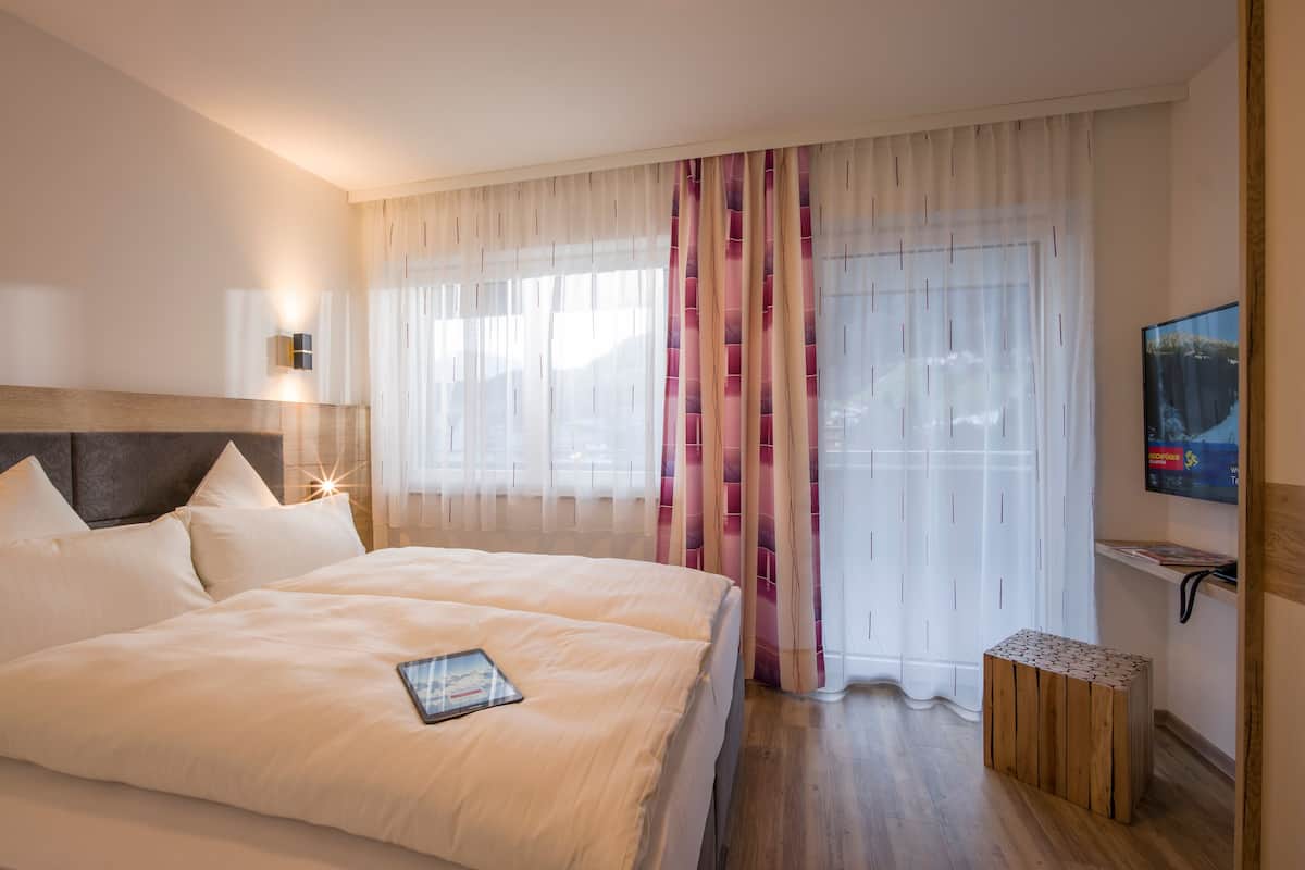 Luxe beddengoed, een kluis op de kamer, individueel gedecoreerd