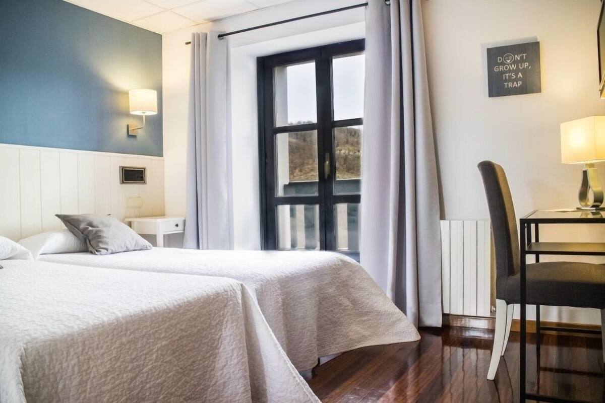 double room, 2 single beds, mountain view | desk, blackout curtains, free wifi, bed sheets