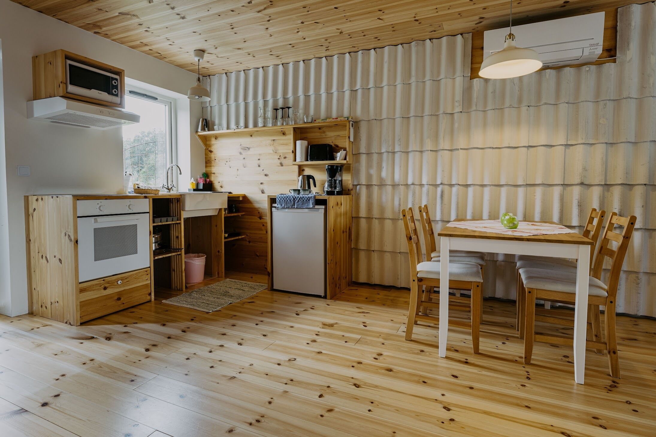 design apartment | private kitchen | fridge, microwave, high chair