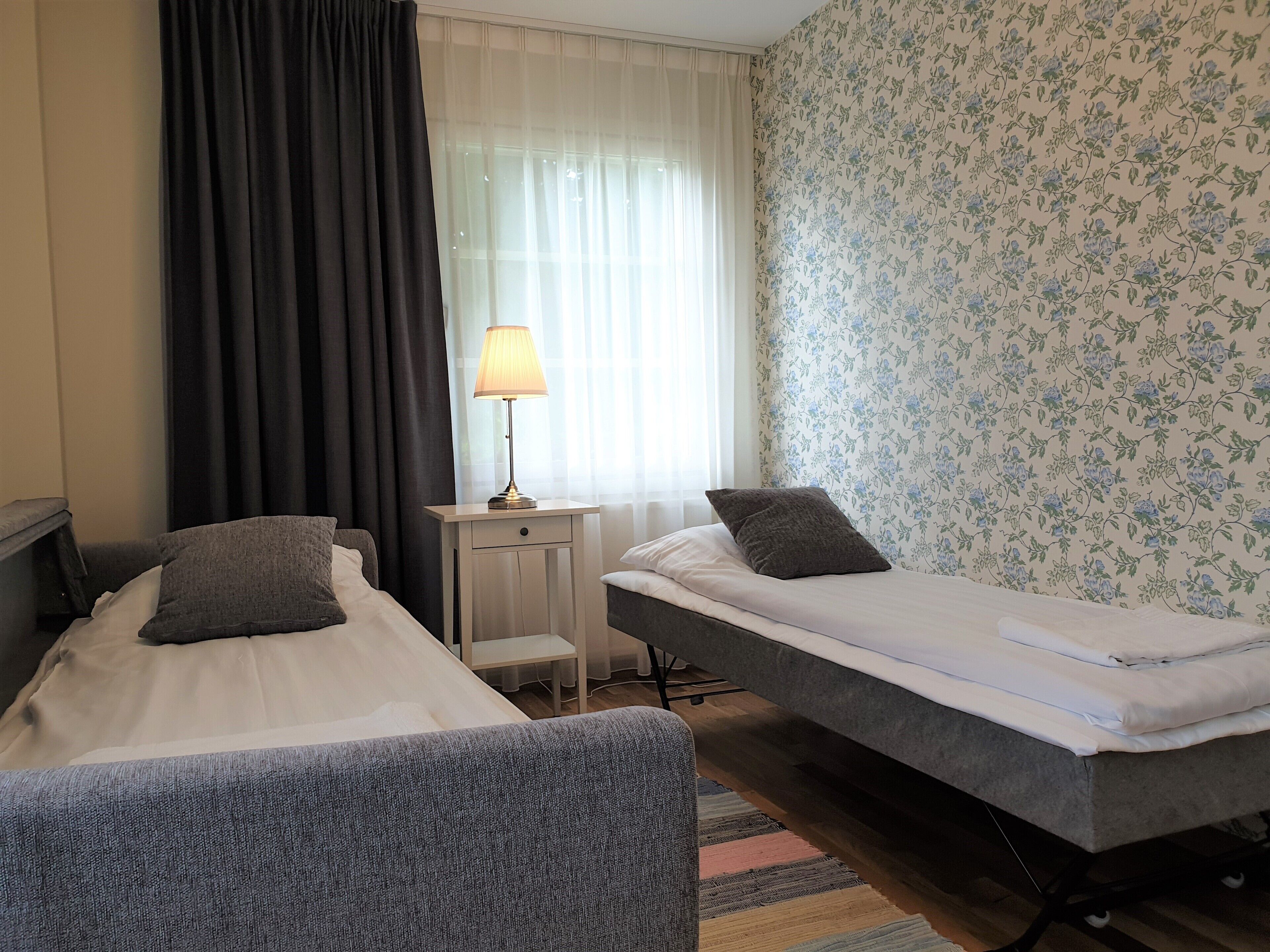 family room, 2 bedrooms, accessible, private bathroom | blackout curtains, iron/ironing board, free wifi, bed sheets