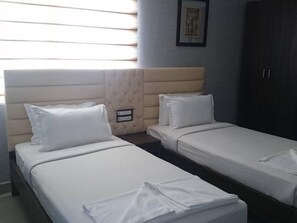 In-room safe, desk, iron/ironing board, rollaway beds