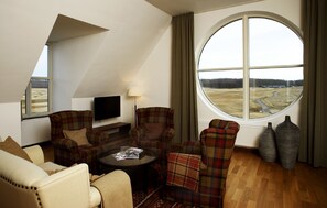 Suite – junior | Oppholdsområde | Flatskjerm-TV