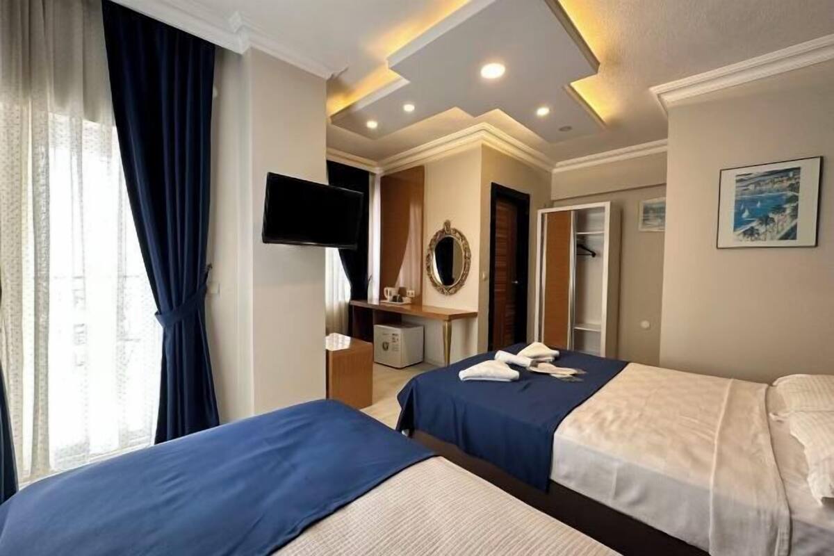 Lakens van Egyptisch katoen, luxe beddengoed, een minibar