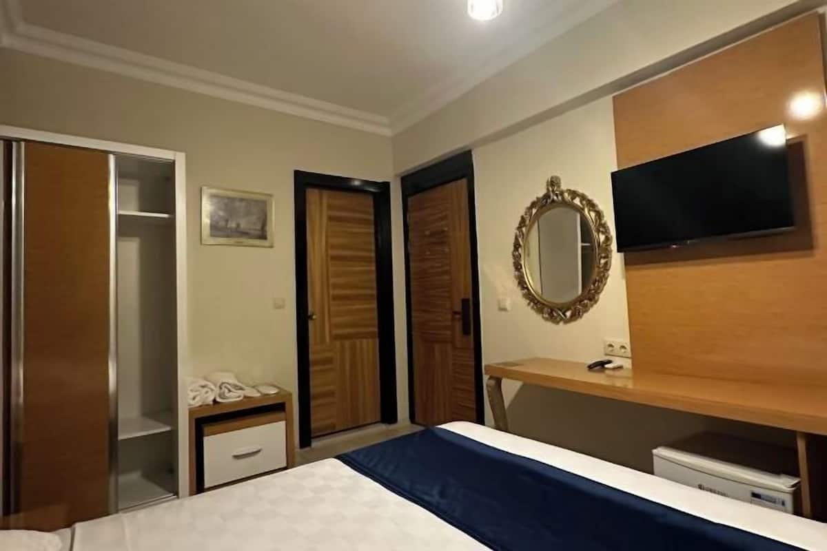 Lakens van Egyptisch katoen, luxe beddengoed, een minibar