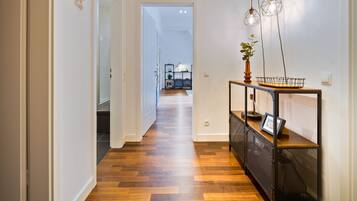 Deluxe Condo (Schwarzwald Lounge) | Living area | 55-cm flat-screen TV with cable channels, TV, Netflix
