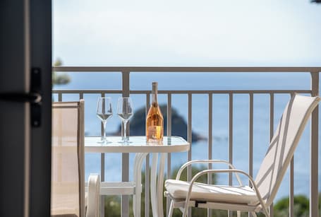 Superior Triple Room, Beach View | Beach/ocean view