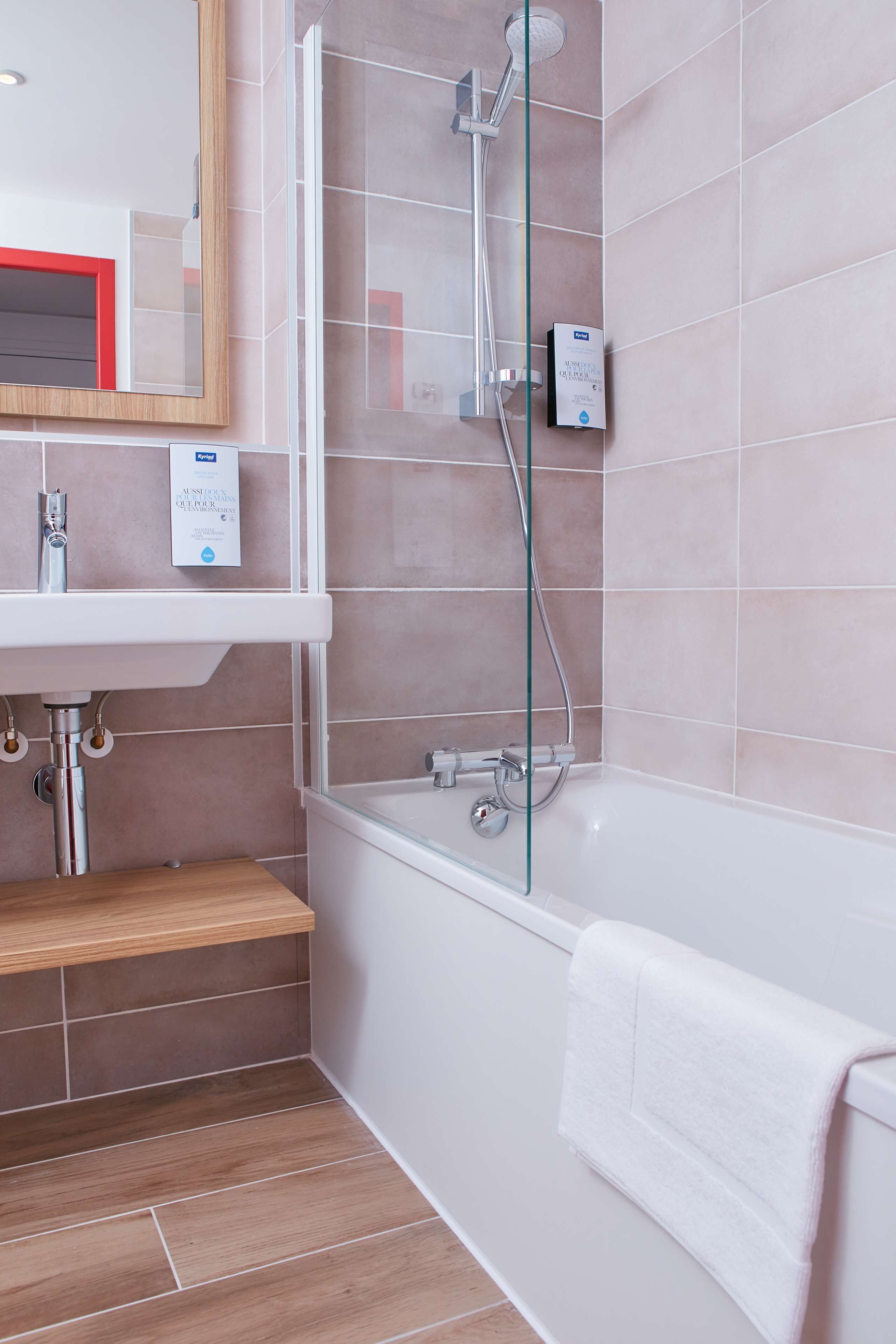 standard room, multiple beds | bathroom | eco-friendly toiletries, towels, soap, shampoo