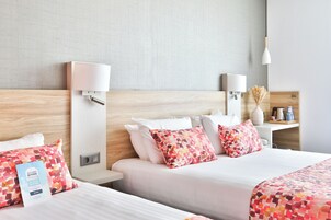 Standard Room, Multiple Beds | In-room safe, desk, soundproofing, free WiFi