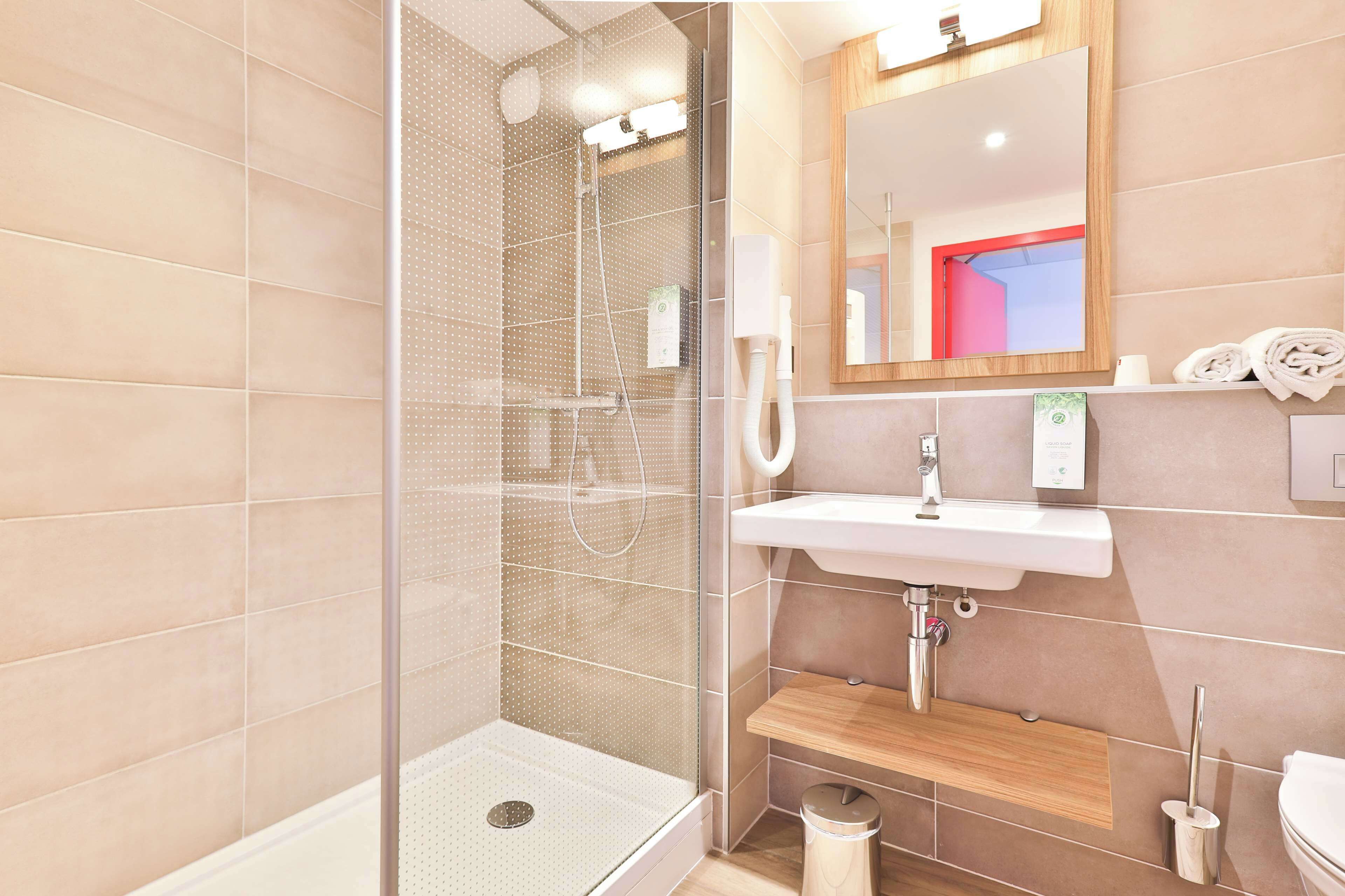 eco-friendly toiletries, towels, soap, shampoo