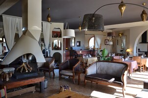 Superior Villa, Multiple Bedrooms, Non Smoking | Restaurant | Breakfast, lunch served; local and international cuisine, pool views 