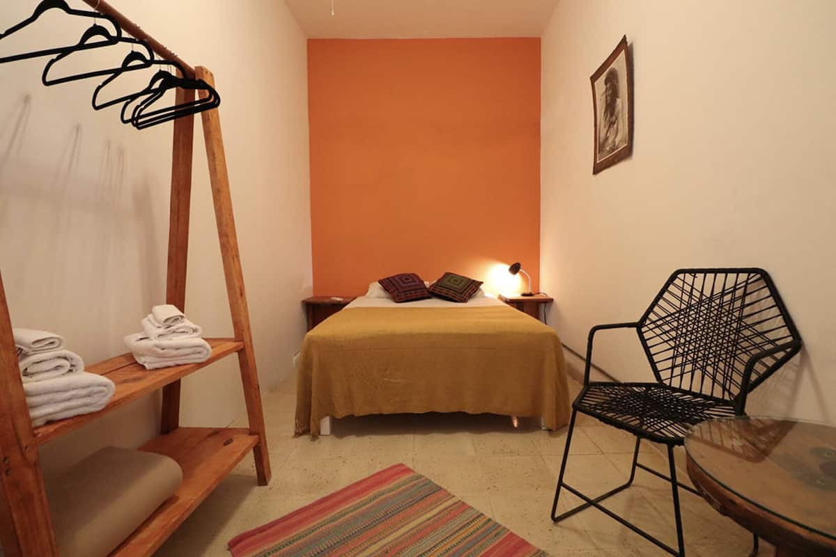 Economy Double Room, 1 Queen Bed, Shared Bathroom | Free WiFi, bed sheets