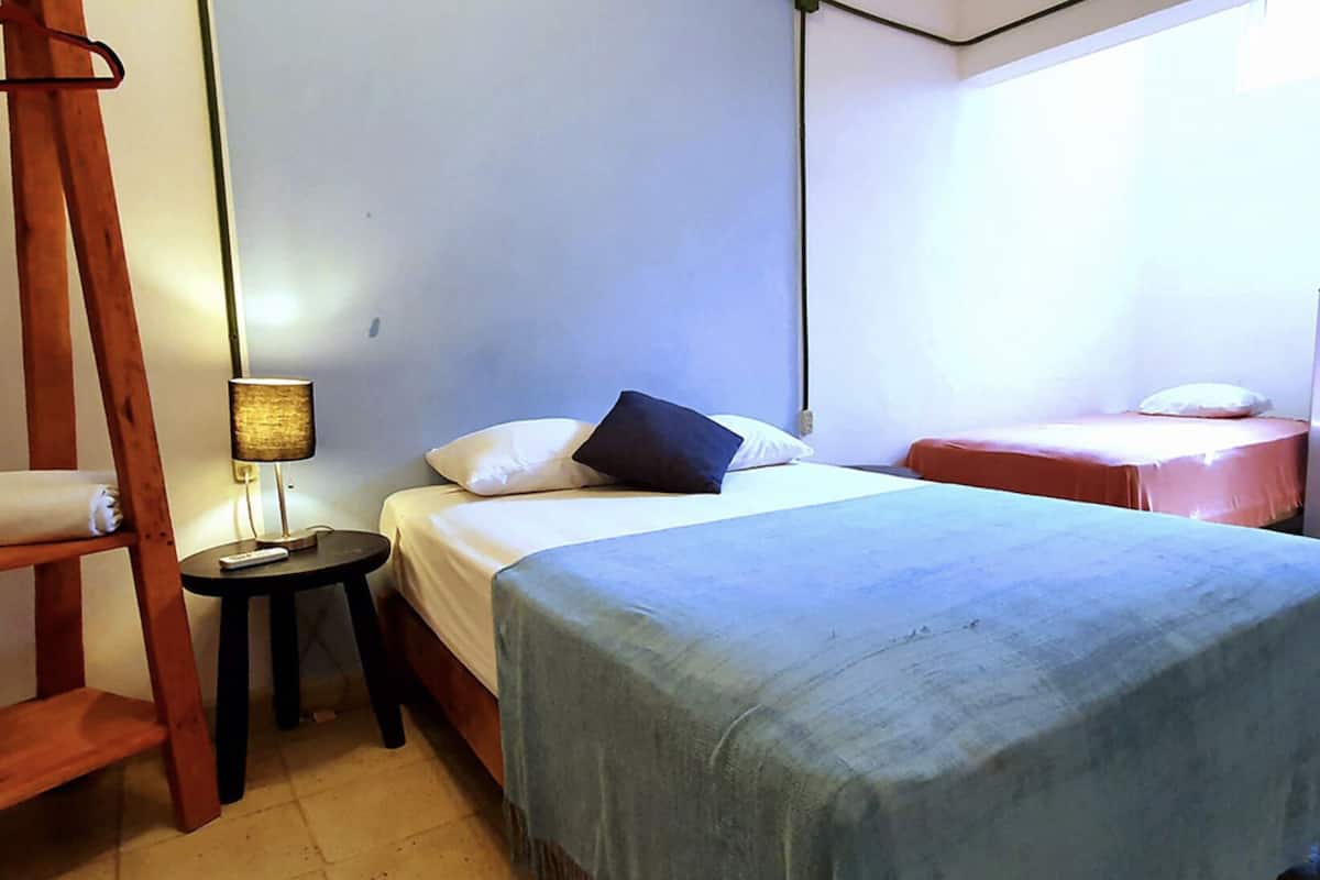 Standard Triple Room, Private Bathroom, Ground Floor | Free WiFi, bed sheets