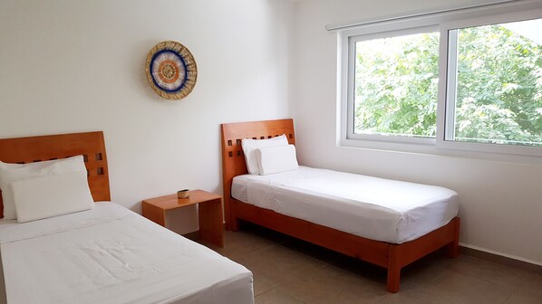 Elite Condo, 2 Bedrooms, Balcony | 2 bedrooms, individually decorated, individually furnished