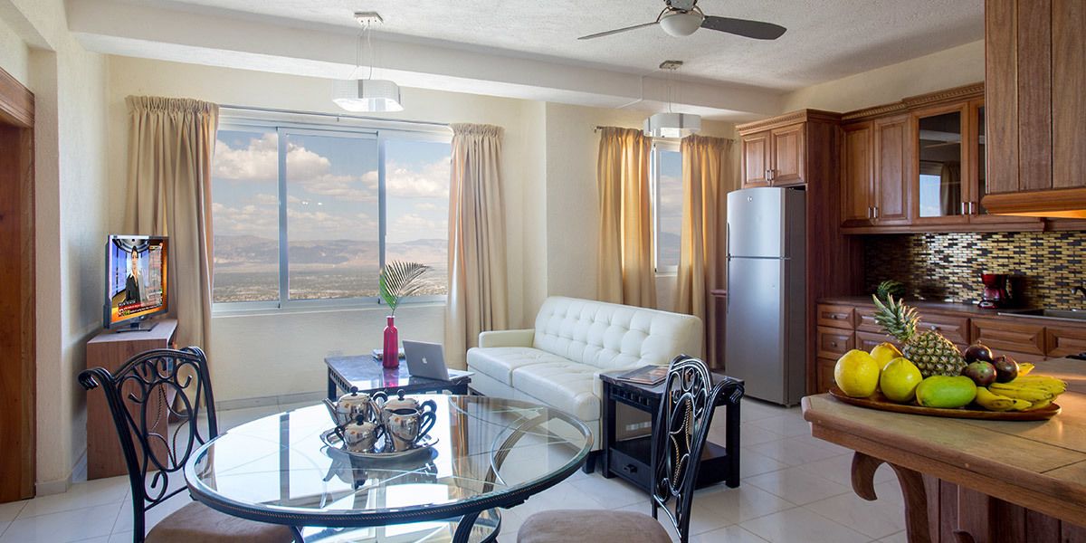 Deluxe Apartment, City View | Living area | Flat-screen TV