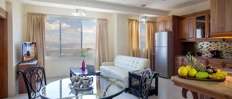 Appartement Deluxe, vue ville | Coin séjour