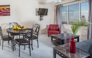 Deluxe Apartment, City View | Living room | Flat-screen TV - Residences Talou (Petionville)