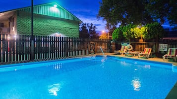 Outdoor pool, open 8:30 AM to 10:00 PM, pool loungers