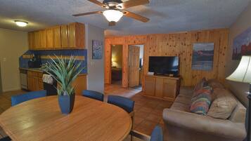 Standard Apartment, 2 Bedrooms, Kitchen | Living room | Flat-screen TV