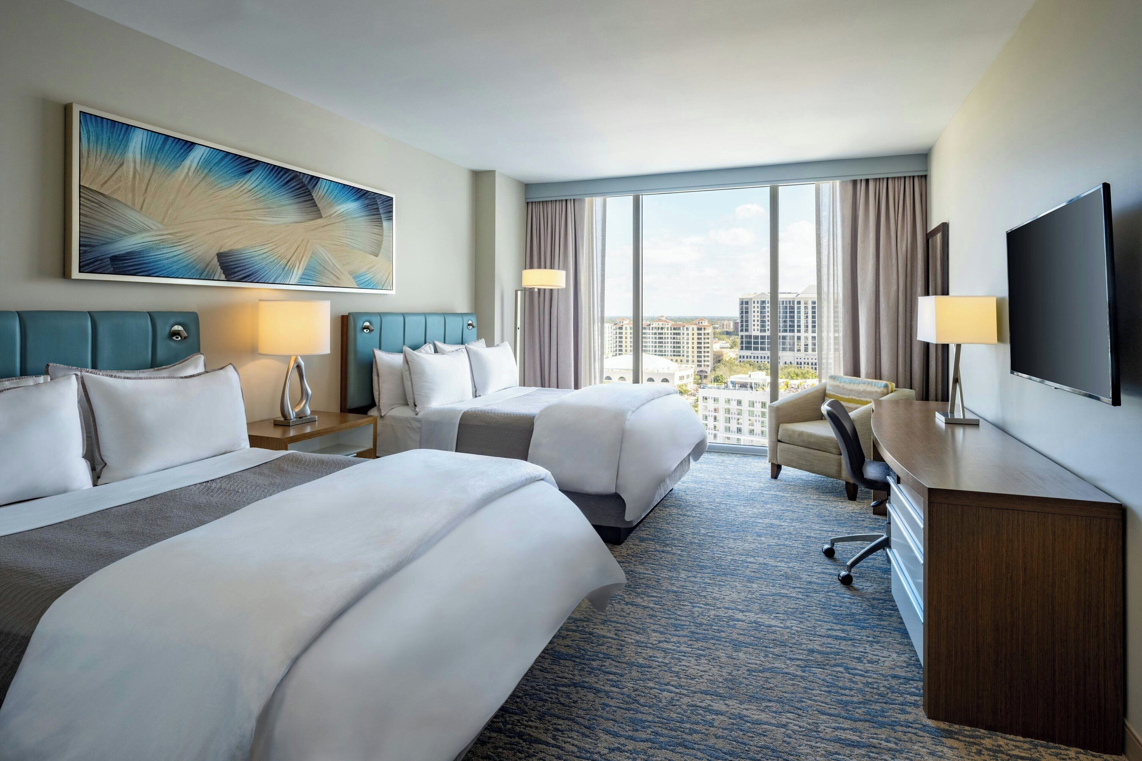 traditional room, 2 queen beds, city view | premium bedding, pillow-top beds, in-room safe, desk