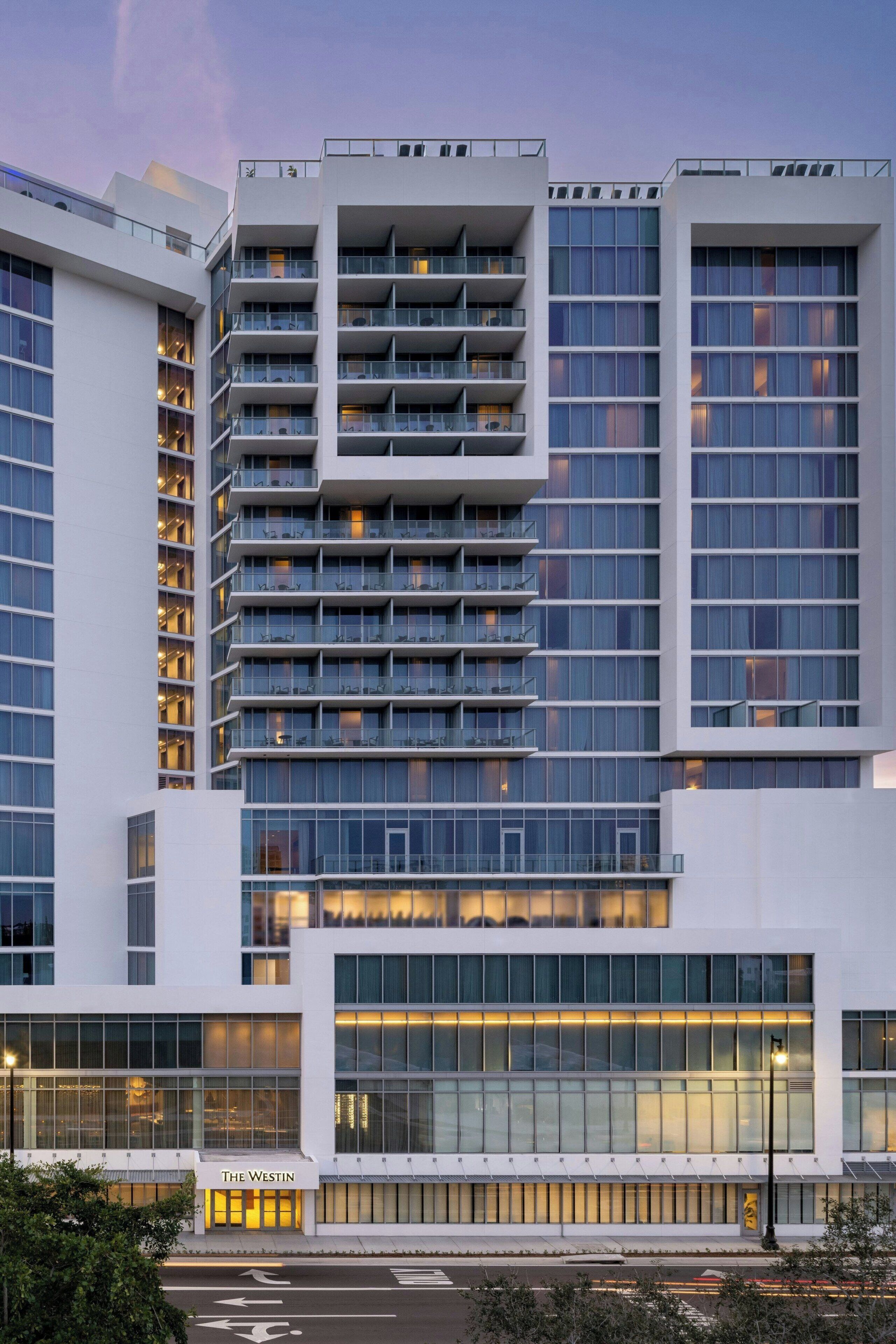 A modern hotel with multiple floors, large windows, and a prominent entrance labeled "The Westin."