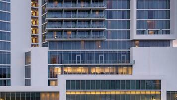 A modern hotel with multiple floors, large windows, and a prominent entrance labeled "The Westin."