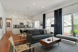 2 Bedroom Penthouse | Living area | 42-inch flat-screen TV with cable channels, TV