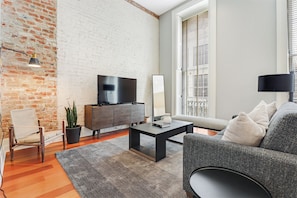 Adjacent Four Bed Four Bath Apartment | Living area | 42-inch flat-screen TV with cable channels, TV