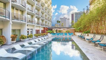 Outdoor pool, open 6:00 AM to 9:00 PM, pool loungers