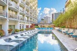 Outdoor pool, open 6:00 AM to 9:00 PM, sun loungers