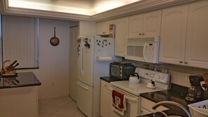Condo, 2 Bedrooms | Private kitchen | Fridge, microwave, oven, stovetop - South Seas Tower 3 1905 (Marco Island)