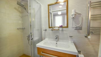 Standard Double Room | Bathroom | Shower, free toiletries, hair dryer, slippers