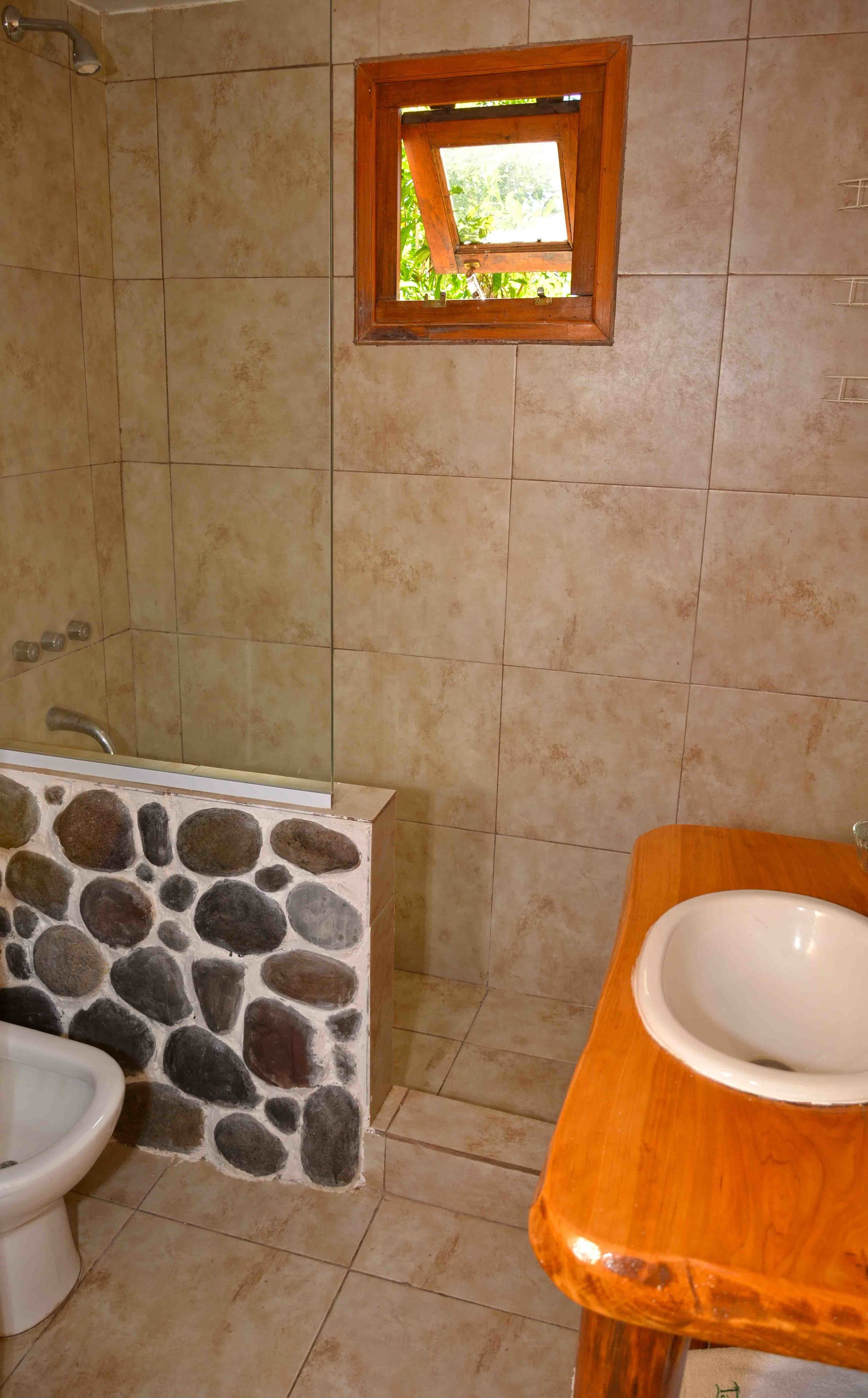 Bungalow, 1 Double Bed | Bathroom | Shower, free toiletries, hair dryer, towels
